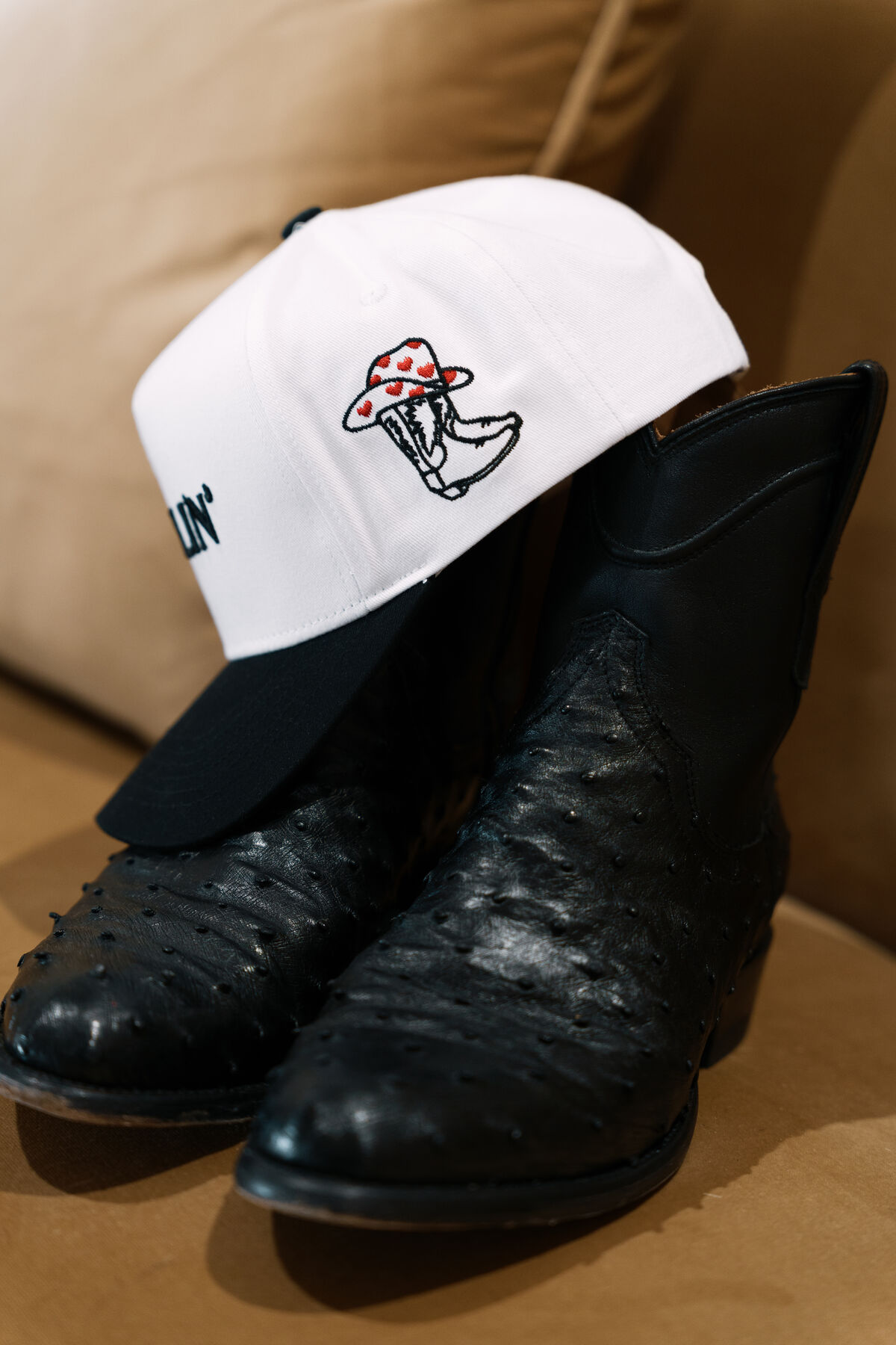 AUG11 barbershop lifestyle — authentic salon setting, fitted hat, fresh cut