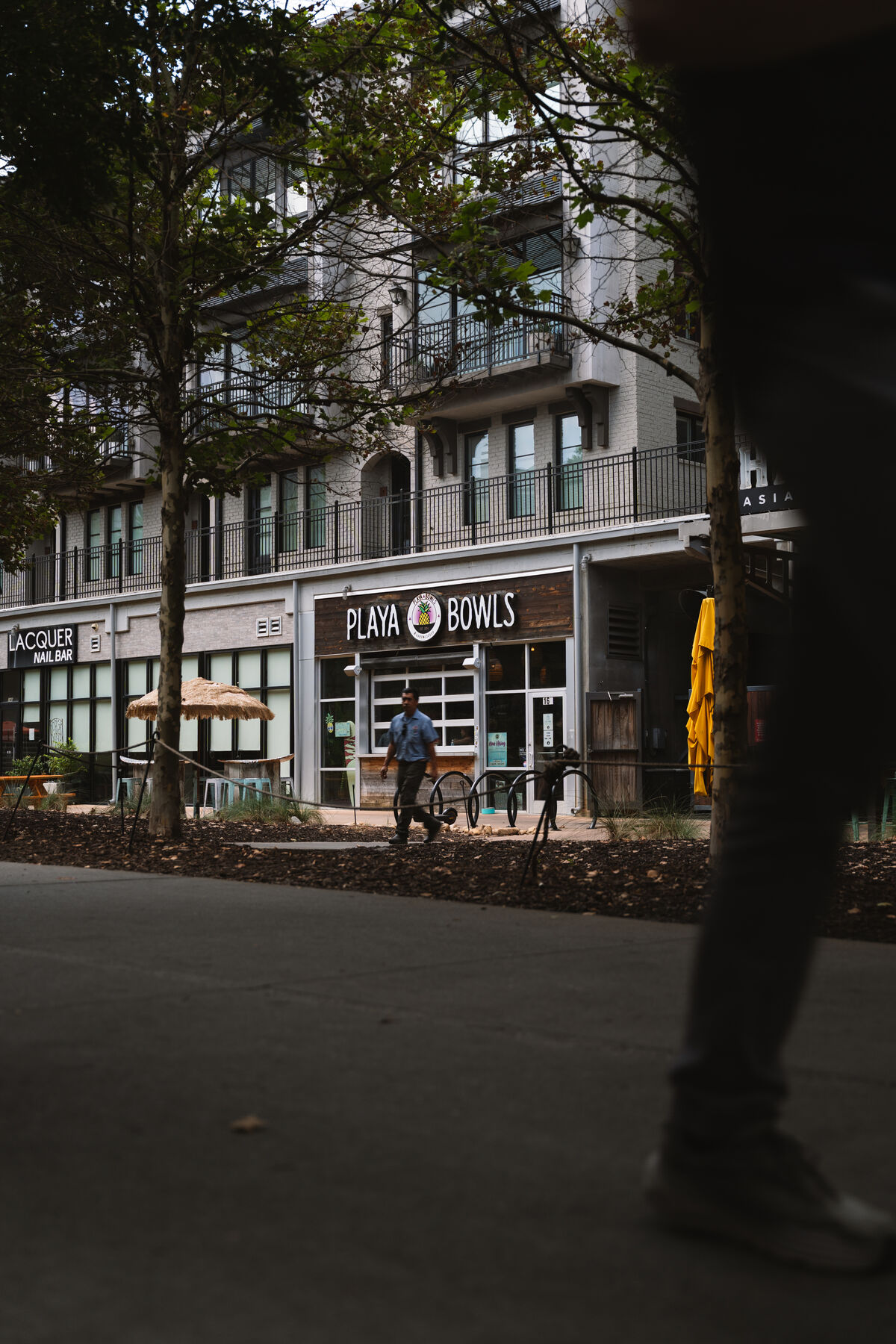 Playa Bowls Atlanta Beltline location exterior — customers and Beltline foot traffic on a sunny day