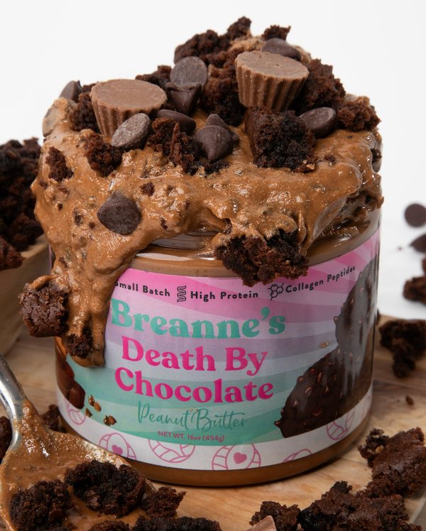 American Dream Nut Butter jar overflowing with chocolate and peanut butter cups